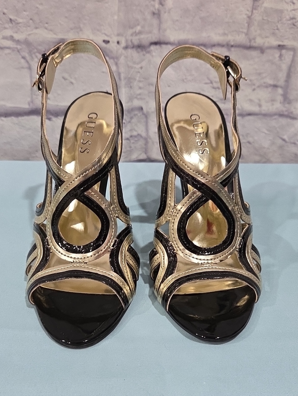 GUESS Black and Gold Cutout Slingback Heels